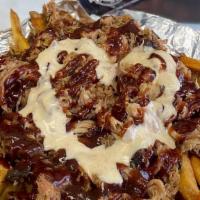 Kretzschy'S Smoked Pulled Pork Fries · Fresh hand-cut fries loaded with smoked pulled pork and topped with our signature blueberry ...