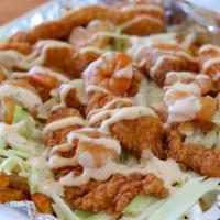 Bayou Fries · The ultimate loaded cajun frie. Hand-cut fries loaded with homemade slaw, fried catfish, shr...