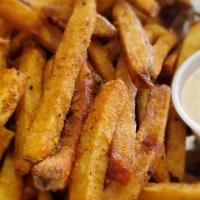 Cajun Fries · Fresh hand-cut fries seasoned with our signature cajun blend of spices. **fried in peanut oil.
