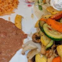 Las Fajitas Lunch · Choice of fajita chicken or beef with guacamole, sour cream, pico de gallo, rice, beans and ...