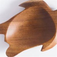 Acacia Wood Turtle Bowl · Hand-carved acacia wood bowl with certified food-safe finish. 7