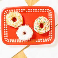 Vanilla Donut · Vanilla icing covered donut. (Sprinkles/toppings available).