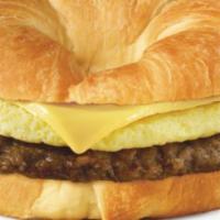 Sausage, Egg, And Cheese Croissant · Croissant biscuit with sausage patty, egg, and cheese.