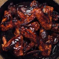 Chicken Wings · Oven roasted wings in a sauce of choice