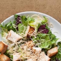 Chicken Salad  · Organic mixed greens tossed with grilled chicken strips, tomatoes, red onions and carrots wi...