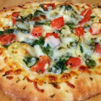 Veg Farmhouse Pizza · Freshly made pizza dough topped black olives, red onions, green peppers, basil, tomatoes, mu...