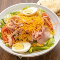 Chef Salad · Fresh garden salad with plenty of, ham, Turkey, Cheese and a boiled egg.