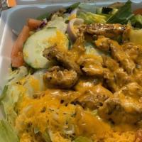 Grilled Chicken Salad · Fresh garden salad with Cheese and a tasty grilled Chicken breast.