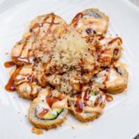Mountain Fuji · A tasty blend of chopped fresh fish, avocado in a mildly spicy sauce, tempura style with shr...
