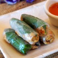 Chicken Basil Wraps · 5-count, minced chicken, basil, carrots, onions, cilantro in rice paper served with sweet ch...