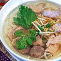 Beef Noodle Soup · Thin rice noodles, sliced flank steak, meatball, bean sprouts, fresh basil, green onions and...