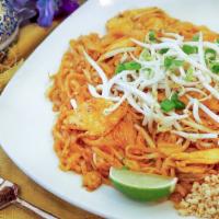 Pad Thai · Thin rice noodles wok tossed in tamarind sauce, egg, green onions, bean sprouts and ground p...