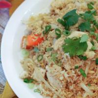 Thai Fried Rice · Jasmine rice wok with egg, tomatoes, onions and scallions. With choices of tofu or meat.