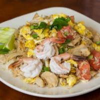 Combination Fried Rice · Fried rice with shrimp, beef, pork and chicken with tomatoes and onions. With choices of tof...