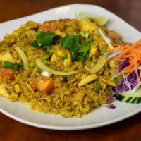 Yellow Curry Fried Rice · Jasmine rice wok with egg and tomatoes. With choices of tofu or meat.