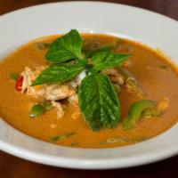Panang Curry · Coconut milk, bell peppers and kaffir lime leaf. Served with steamed rice.