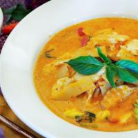 Red Curry · Coconut milk, eggplant, bamboo shoots, zucchini, bell peppers and fresh basil. Served with s...