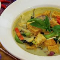 Green Curry · Coconut milk, eggplant, bamboo shoots, zucchini, bell peppers, and fresh basil. Served with ...