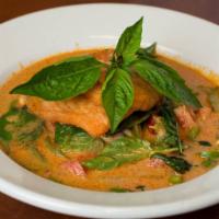 Salmon Curry · Grilled Fillet Salmon, Bell pepper and fresh Basil with choice of Red or Green Curry