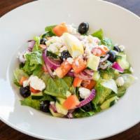 Greek · Feta cheese, tomato, cucumber, onion and olives tossed in olive oil served with mixed salad ...