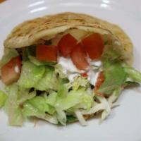 Gordita · Prepared with your choice of meat, cilantro, onions, cheese, lettuce, avocado, tomatoes, and...