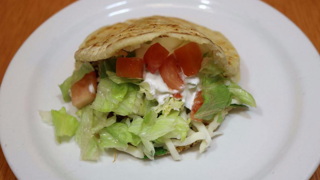 Gordita · Prepared with your choice of meat, cilantro, onions, cheese, lettuce, avocado, tomatoes, and sour cream.