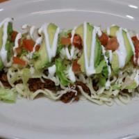Huarache · Prepared with your choice of meat, beans, cilantro, onions, cheese, lettuce, avocado, tomato...