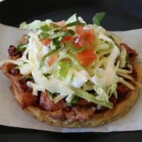 Sope · Prepared with your choice of meat, beans, cilantro, onions, cheese, lettuce, avocado, tomato...