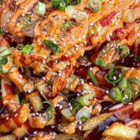 Kimchi Fries · caramelized kimchi, hoisin sauce, spicy mayo, candied gochujang, green onions, cilantro, ses...