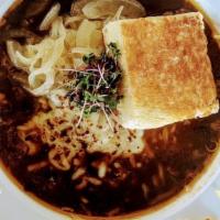 French Onion Soup · 72 hr Pho Broth, sous vide onions, fried shallots, crostini