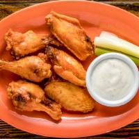 Wings (6) · Six fresh fresh wings fried to perfection served with ranch dressing and french fries. Wing ...