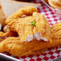 Golden Crispy Catfish & Signature Waffles · Delicious, Southern-style Crispy Catfish Fillet, seasoned with house spices, served with Sig...