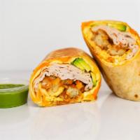 Smoked Turkey, Avocado, Egg, And Cheddar Burrito · 3 fresh cracked cage-free scrambled eggs, melted Cheddar cheese, smoke turkey, avocado, and ...