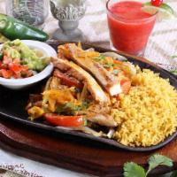 Fajitas A La Mexicana (For Two) · Your choice of beef, chicken or combo with sauteed onions, tomatoes, jalapeno peppers and ci...