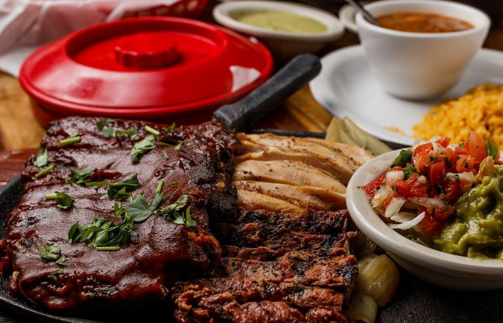 The Ribs Combo · 1/4 rack of ribs and your choice of fajitas or 4 grilled shrimp.