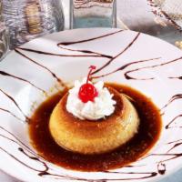 Flan · Homemade light Mexican egg custard with homemade Mexican caramel sauce and whipped cream.