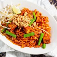Pad Thai · Gluten-free. Rice noodles, bean sprout, tofu, scallion, egg, peanut, tamarind sauce.
(Contai...