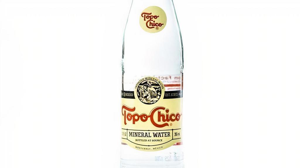 Topo Chico Sparkling Water · A fizzy, refreshing beverage sold in bottles.