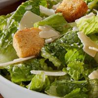 Caesar Salad · Caesar salad is served with croutons and shaved Parmesan cheese. Add grilled chicken for an ...