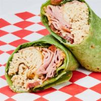 American Wrap · Turkey, Ham, Cheddar, Spinach Leaves, Tomato, Mayo on Spinach or Tomato Basil Wrap