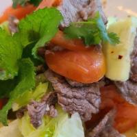 Beef Salad · Grilled beef with lettuce, onion cucumber, tomato, and lime juice.