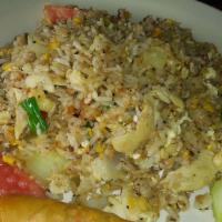 Thai Fried Rice · The old-style thai rice, egg, tomatoes, and onions stir-fried.