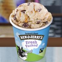 Americone Dream® · Vanilla ice cream with fudge covered waffle cone pieces and a caramel swirl.