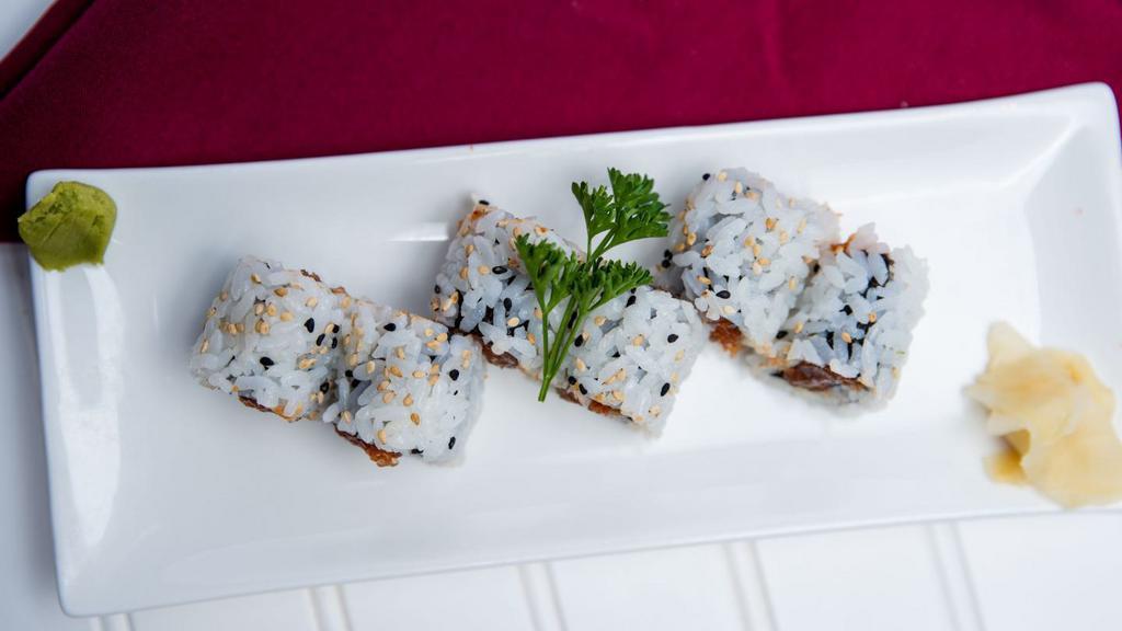 Spicy Tuna Roll · Inside; tuna with spicy mayonnaise outside; rice, sesame seeds.