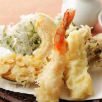 Tempura · Deep fried shrimp and assorted vegetables in a light tempura batter.
