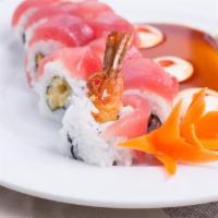 Colleyville Roll · Spicy. Tempura shrimp, topped with tuna & specialities sauce.