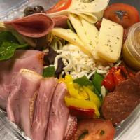 Antipasto Salad · House salad with assorted italian meats cheese and olives.