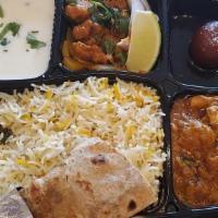 1 Entree Chicken Lunch Combo · A Great Value meal consisting of  Non Veg personal portion Appetizer, Pulao (flavored Biryan...