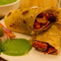 Kati Rolls With Chicken · 2 Roti rolls. Boneless sautéed Chicken, Onions and Bell peppers to make it a perfectly succu...