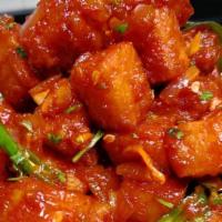 Paneer 65 · Soft Indian cottage cheese sautéed in special 65 sauce.